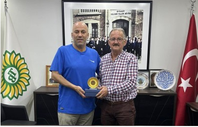 Ali Gencal'a başarı plaketi