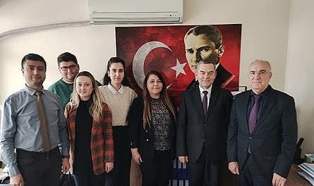Personellerle bir araya geldi.