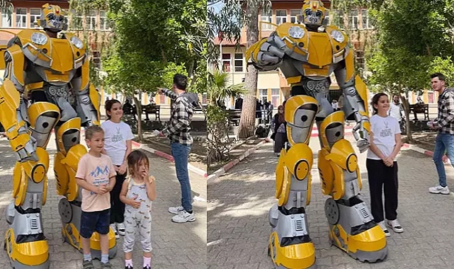 Oy kullanmaya robot kostümüyle geldi