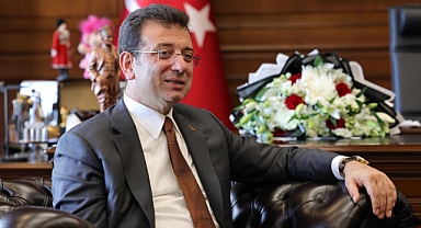 AKGÜN'Ü MAKAMINDA TEBRİK ETTİ
