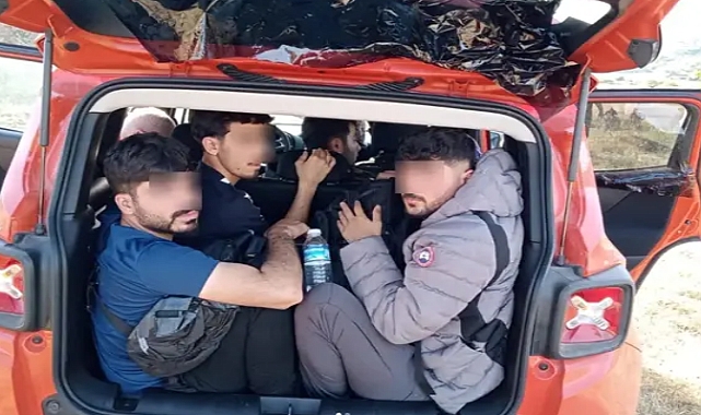 Polisten kaçan otomobilde 9 kaçak göçmen çıktı